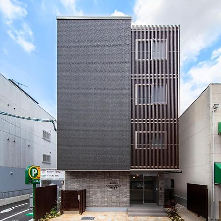 GRAND BASE Okayama Ekimae Aparthotel Bagian luar foto