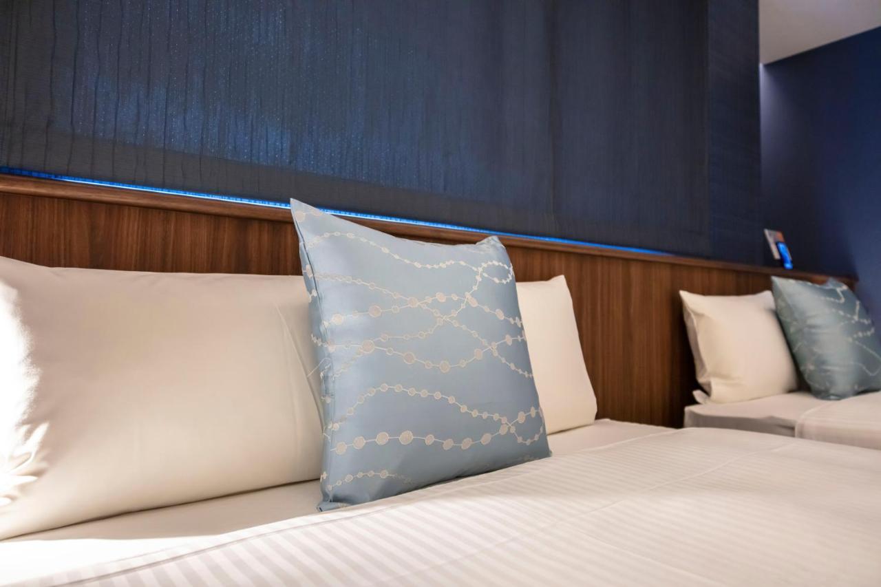GRAND BASE Okayama Ekimae Aparthotel Bagian luar foto