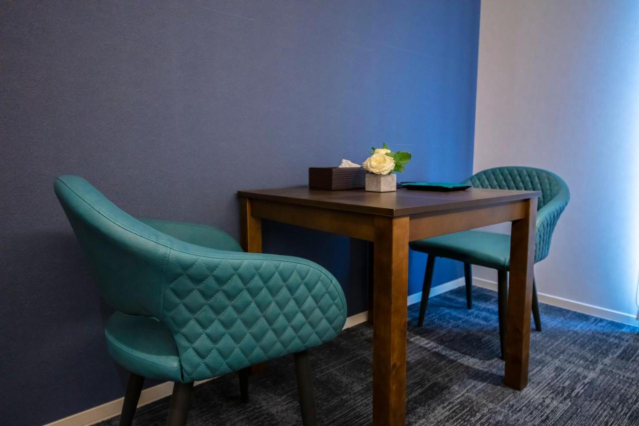 GRAND BASE Okayama Ekimae Aparthotel Bagian luar foto
