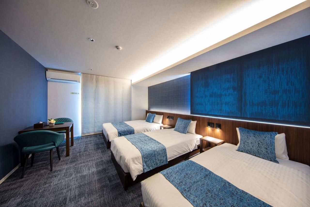 GRAND BASE Okayama Ekimae Aparthotel Bagian luar foto