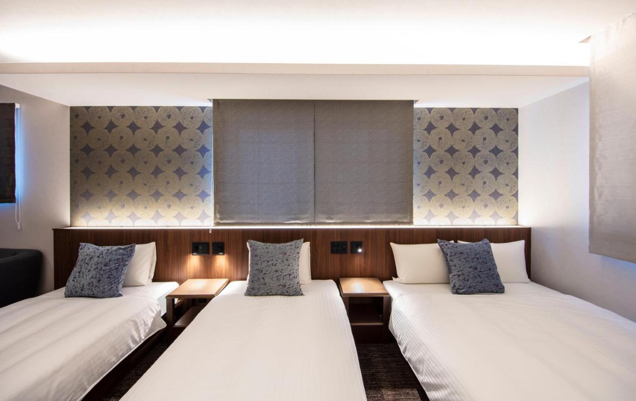 GRAND BASE Okayama Ekimae Aparthotel Bagian luar foto