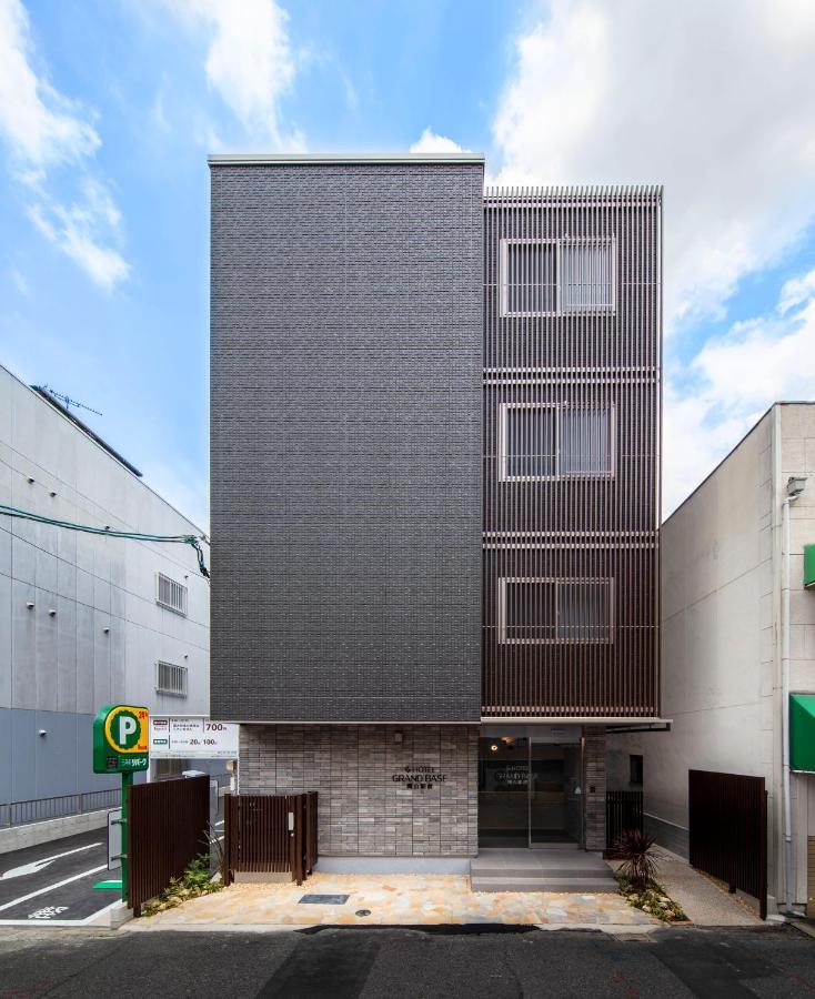 GRAND BASE Okayama Ekimae Aparthotel Bagian luar foto