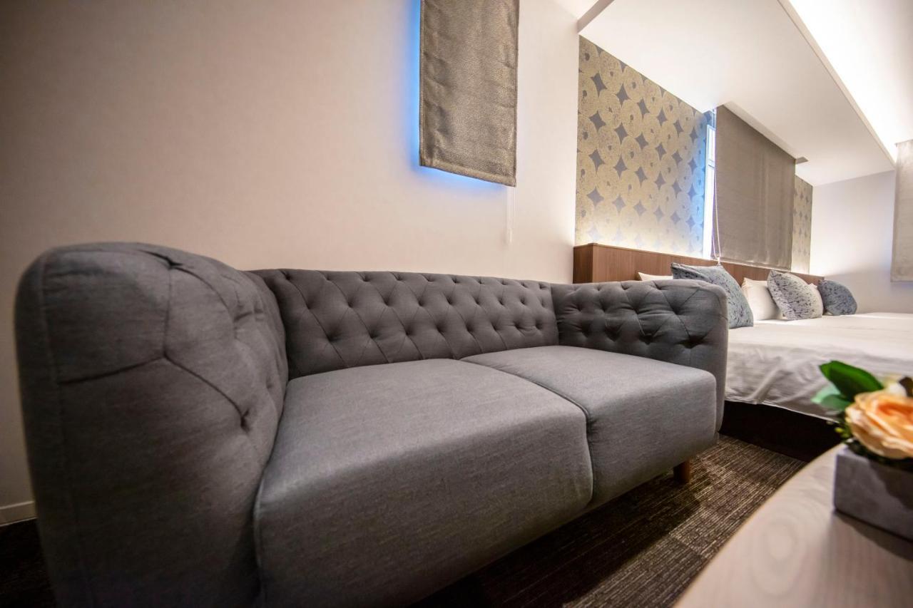 GRAND BASE Okayama Ekimae Aparthotel Bagian luar foto
