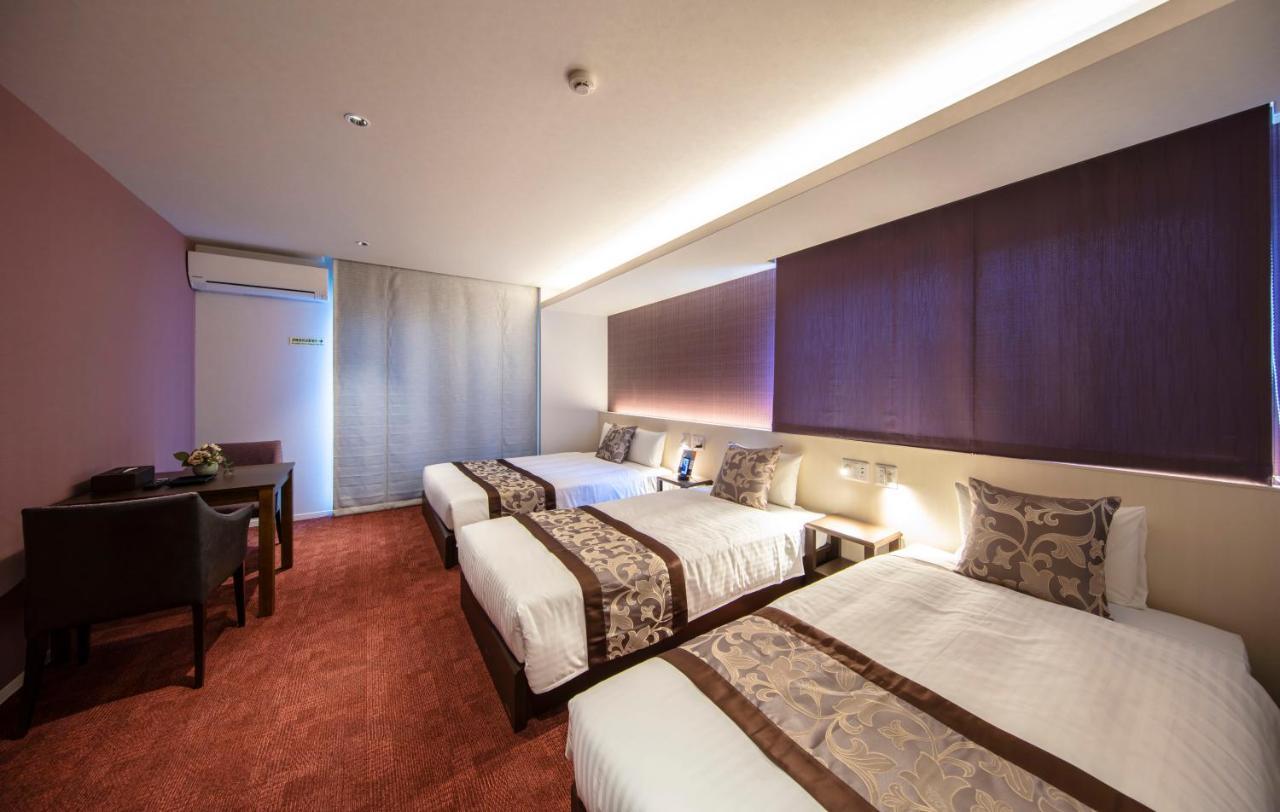 GRAND BASE Okayama Ekimae Aparthotel Bagian luar foto