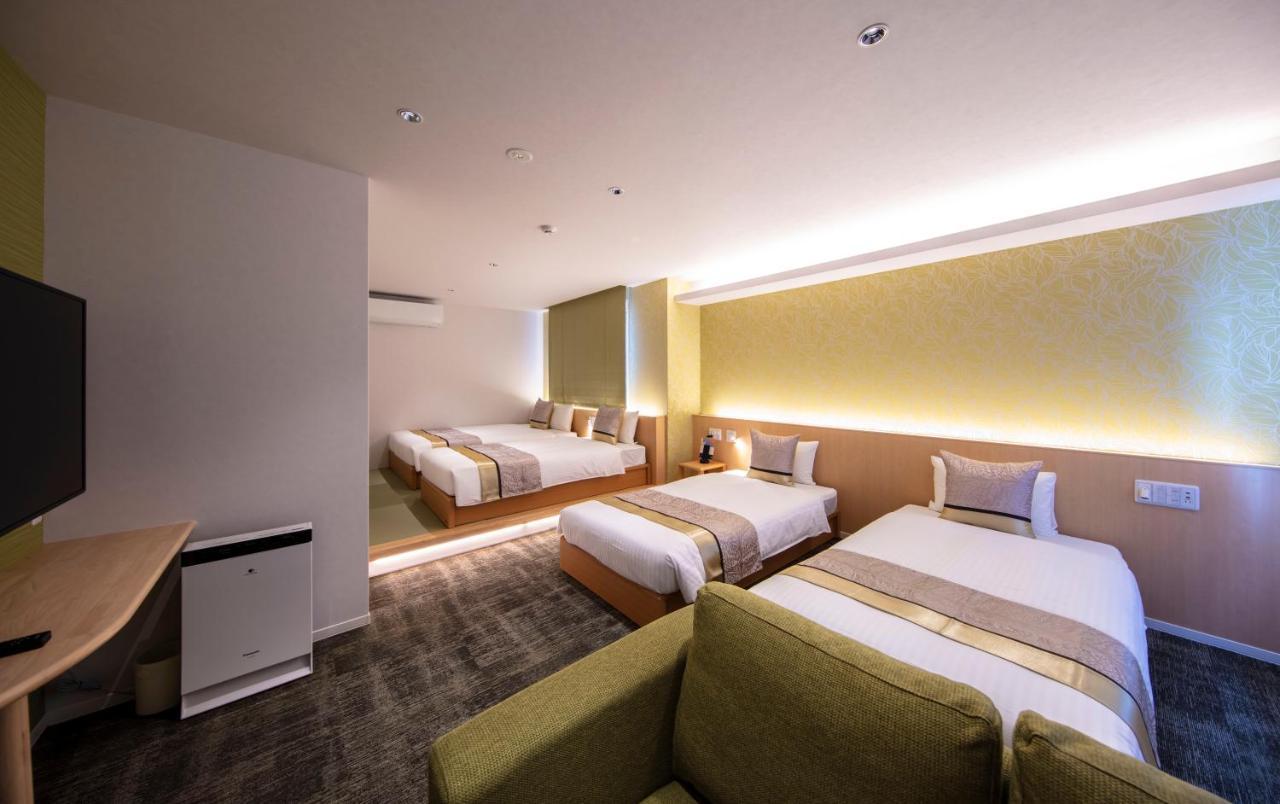 GRAND BASE Okayama Ekimae Aparthotel Bagian luar foto