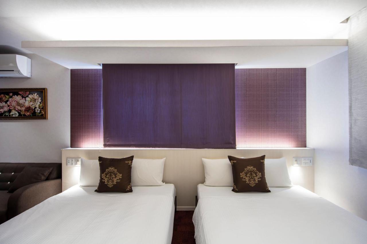 GRAND BASE Okayama Ekimae Aparthotel Bagian luar foto