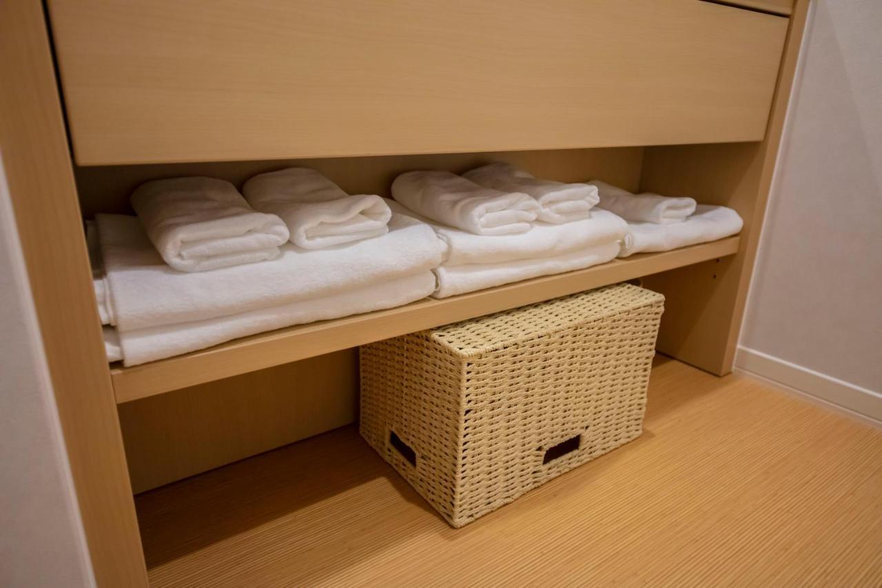 GRAND BASE Okayama Ekimae Aparthotel Bagian luar foto