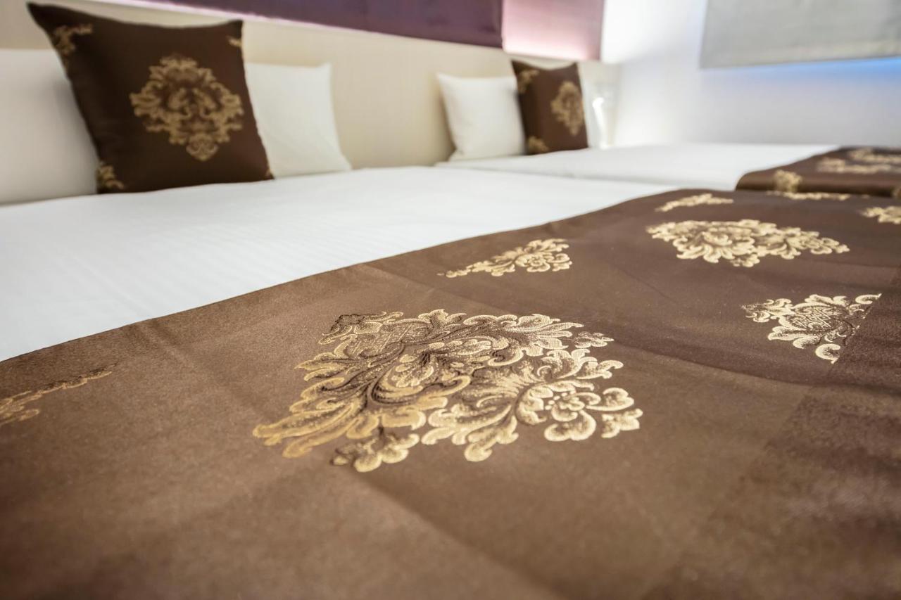 GRAND BASE Okayama Ekimae Aparthotel Bagian luar foto