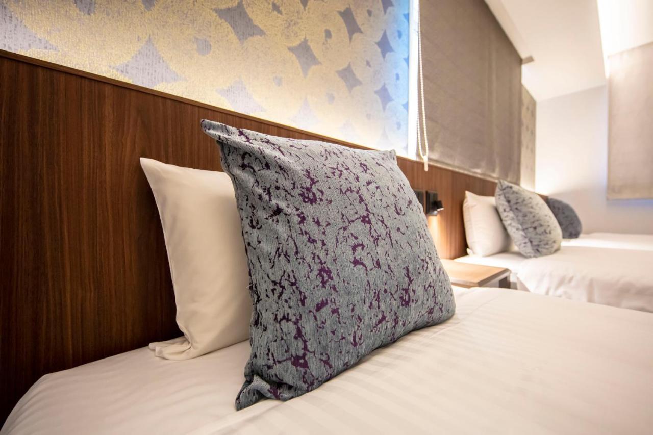 GRAND BASE Okayama Ekimae Aparthotel Bagian luar foto