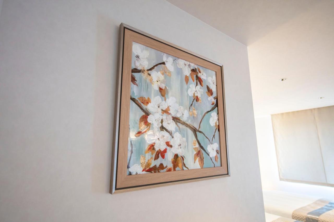 GRAND BASE Okayama Ekimae Aparthotel Bagian luar foto