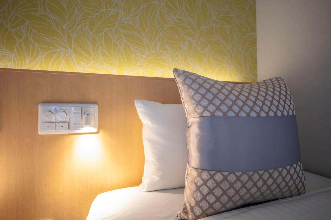 GRAND BASE Okayama Ekimae Aparthotel Bagian luar foto