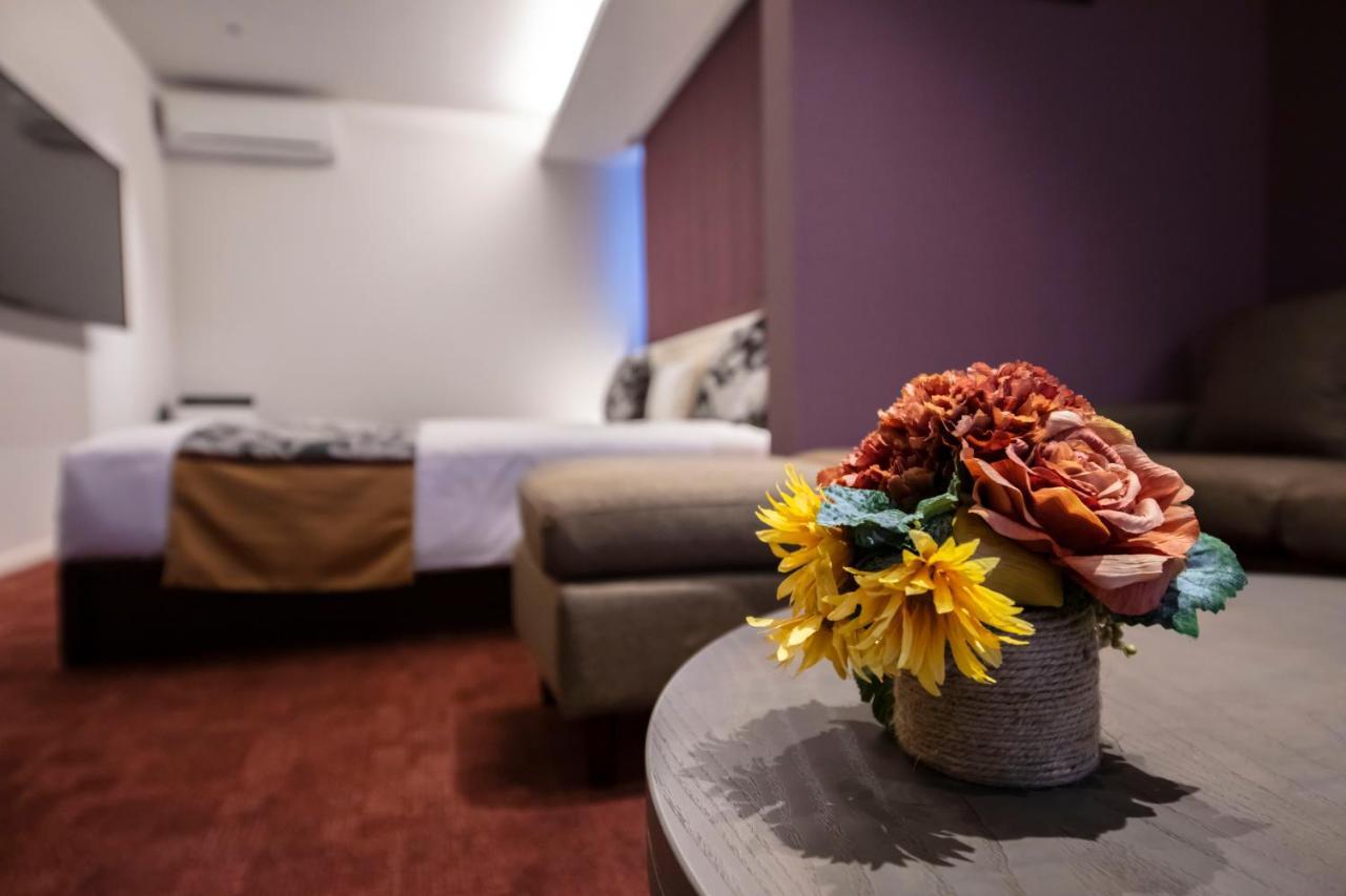 GRAND BASE Okayama Ekimae Aparthotel Bagian luar foto