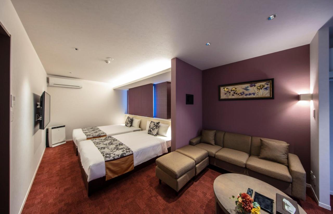 GRAND BASE Okayama Ekimae Aparthotel Bagian luar foto